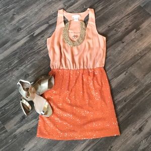 Orange and peach dress.